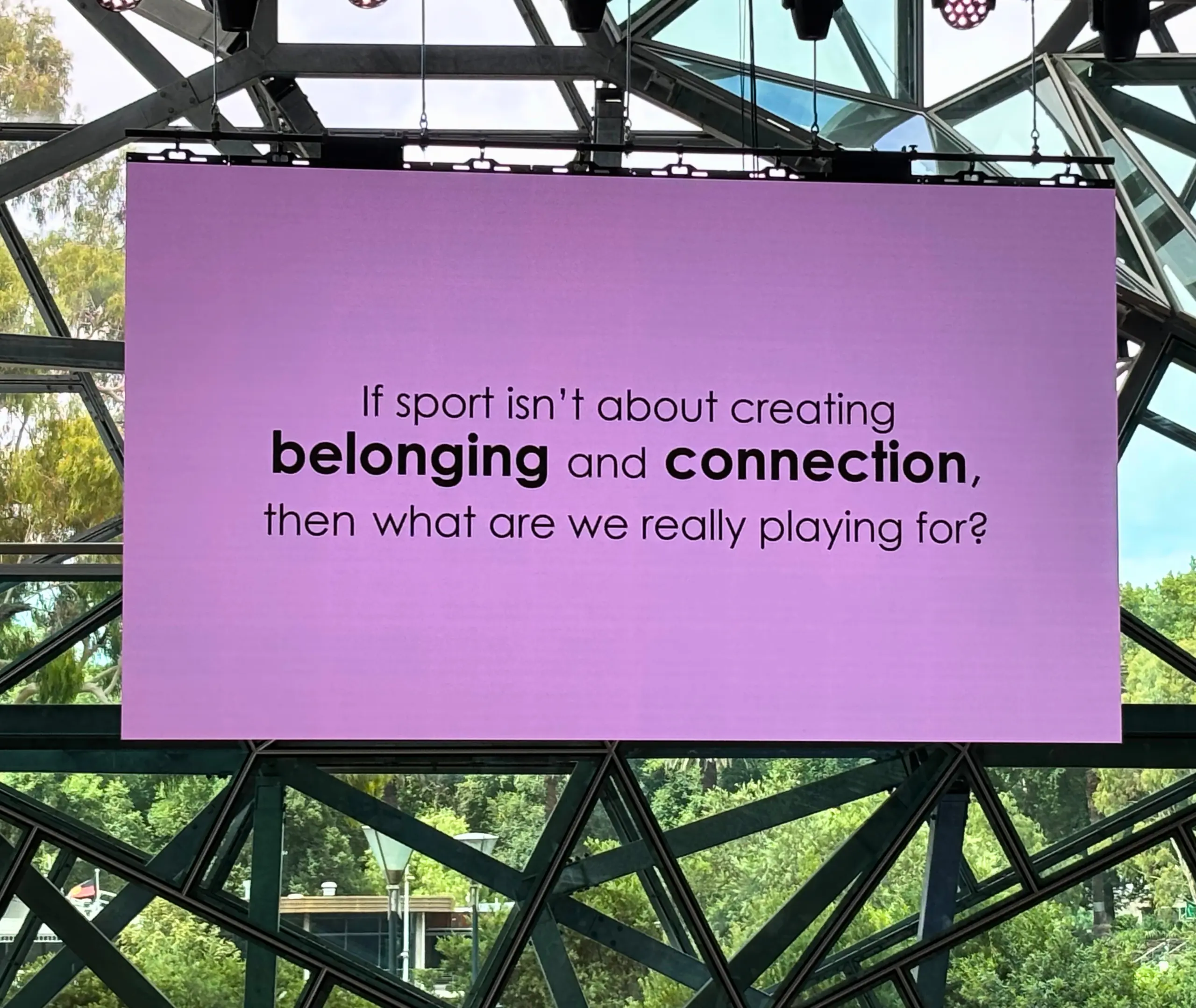 The image features a panel discussion on stage at the DISA Forum. Mitch Gourley, Sport4All National Manager, is speaking while seated alongside the day’s facilitator, Shelly Ware. Jade Narkle and Mitch Nivalis, the other panellists, are seated next to them, engaged in the conversation.