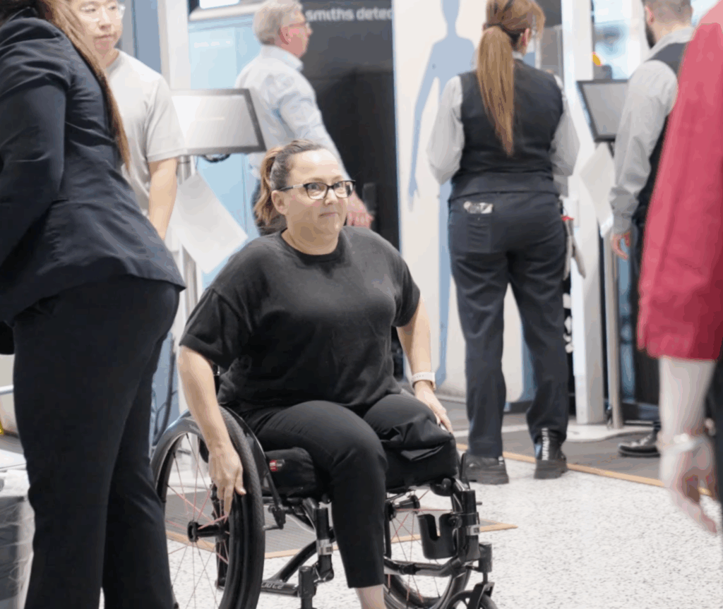 A woman on a wheelchair wearing a black shirt